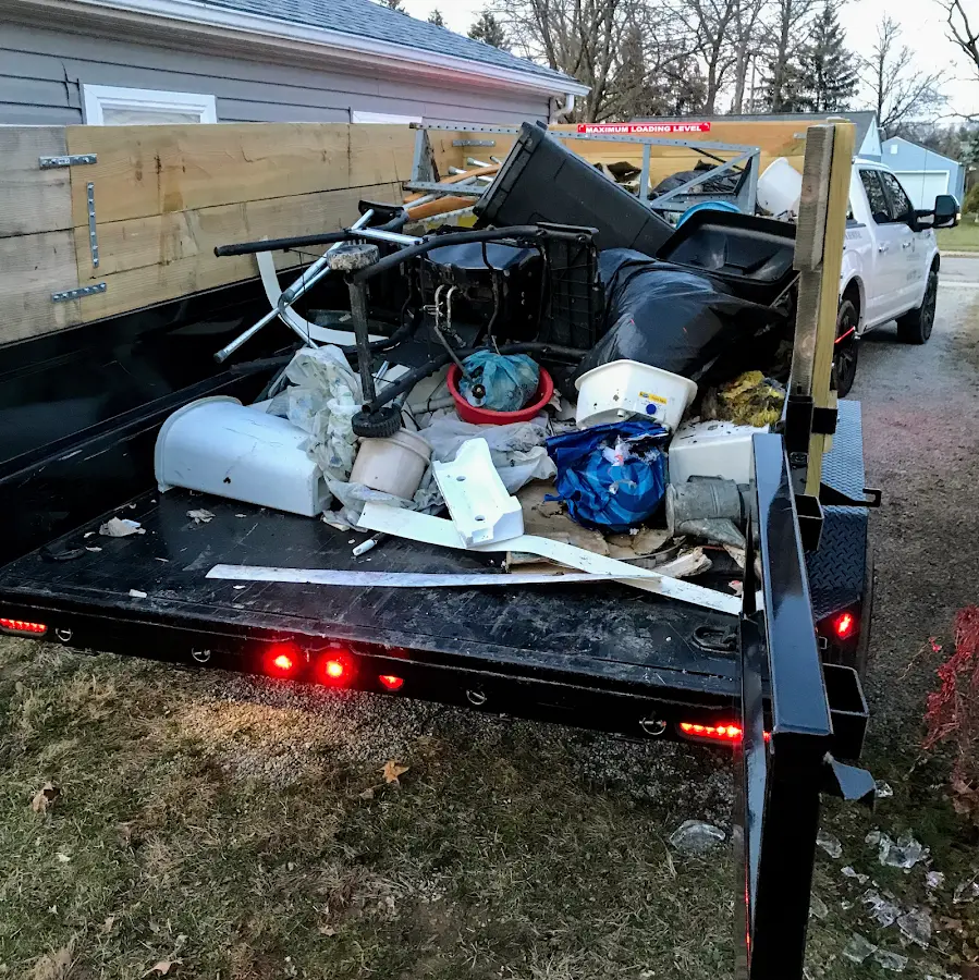Roll-off dumpster delivered to a residential driveway in Oneida