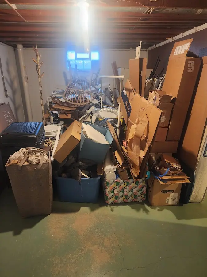 Roll-off dumpster container at job site for Construction Dumpster Rental in Oneida